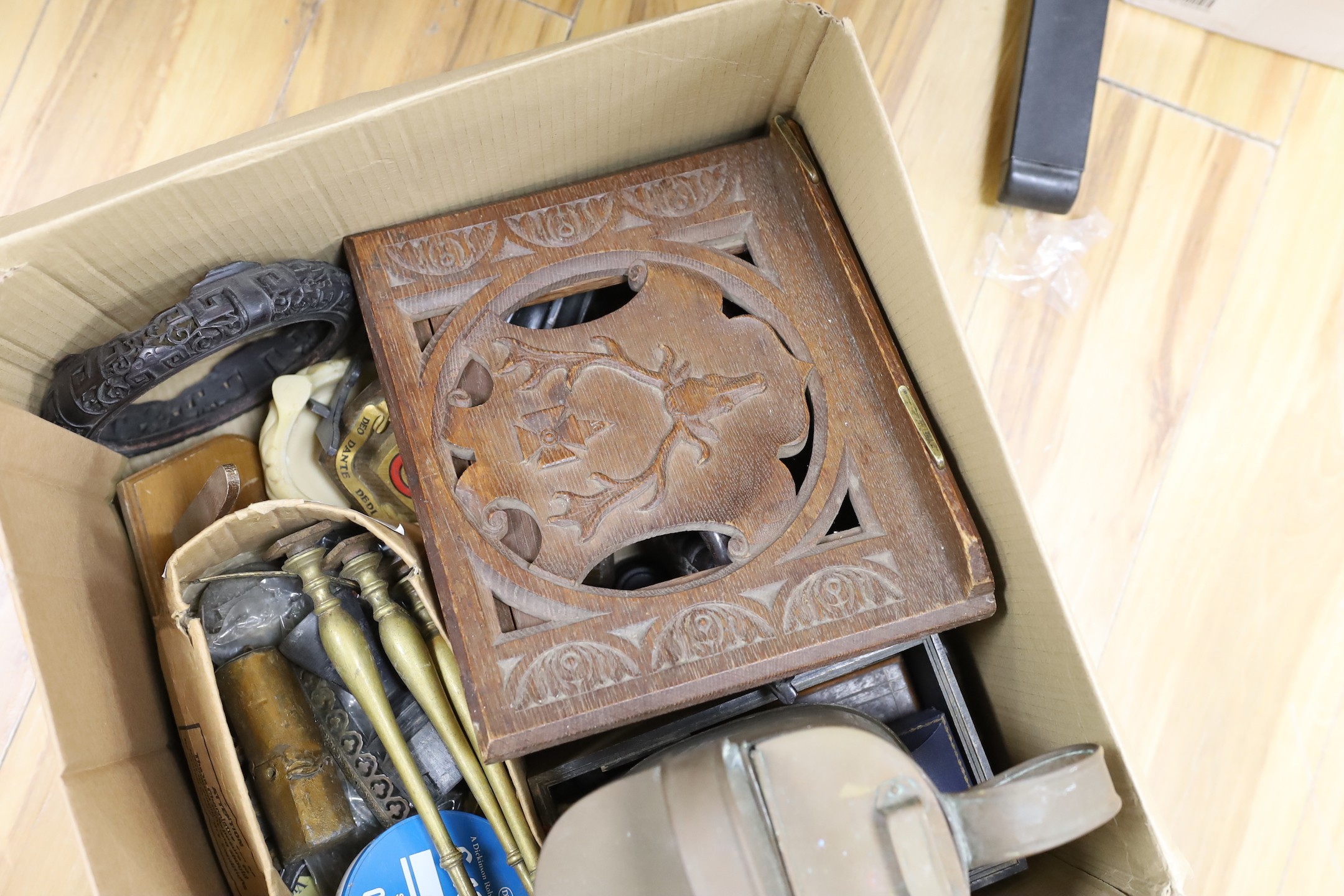 A carved oak lecturn and other wood and mixed metalware